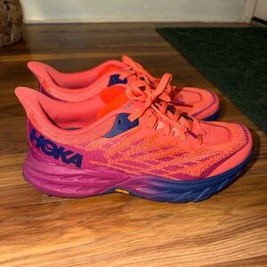 Hoka Vibrant Orange and Purple Sneakers